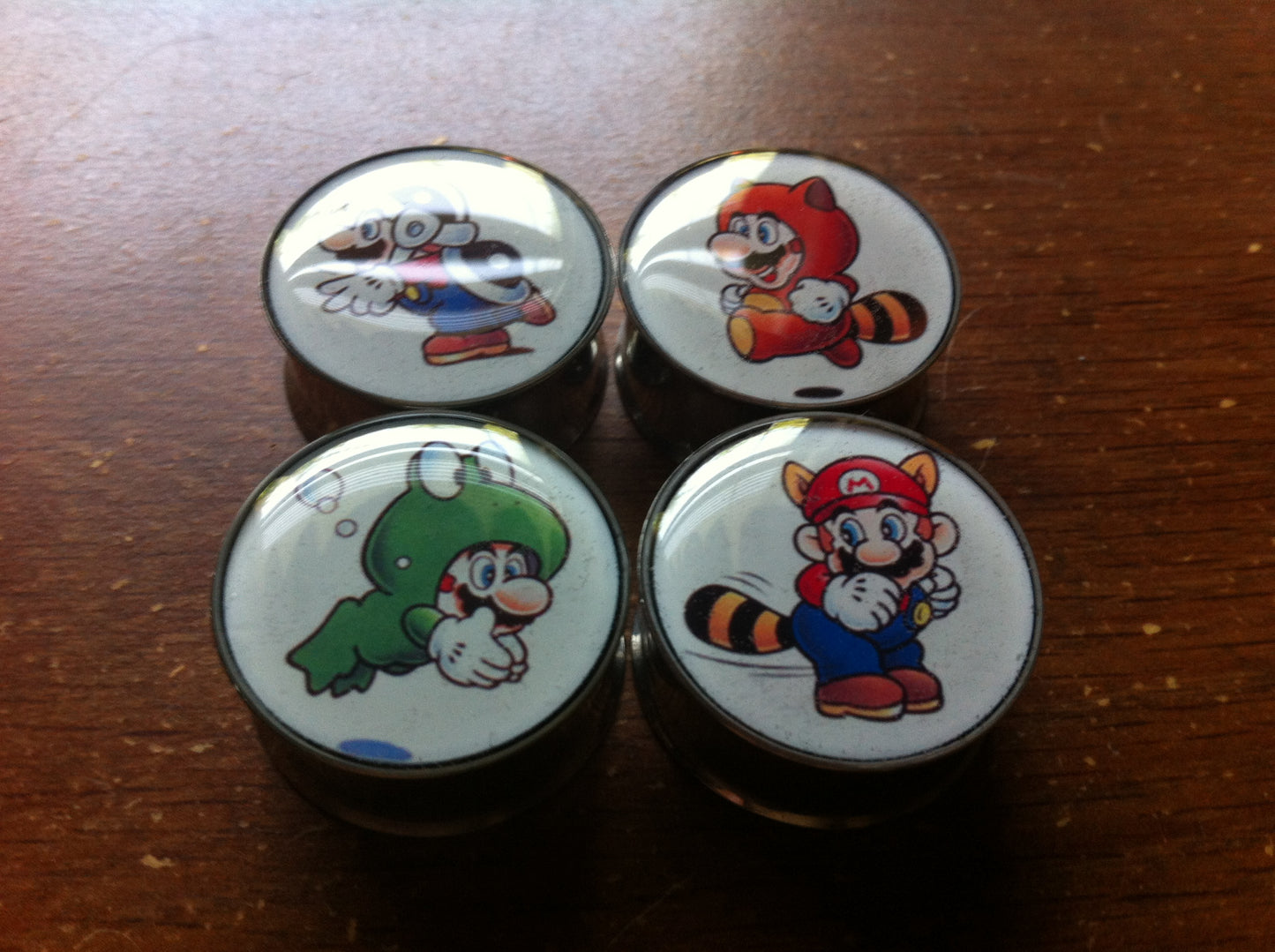 Tapones/medidores Super Mario (ELIJA 2) (¡Compre 2 pares y obtenga 1 par gratis!)